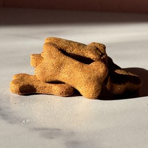 Bone shaped dog treats on a counter